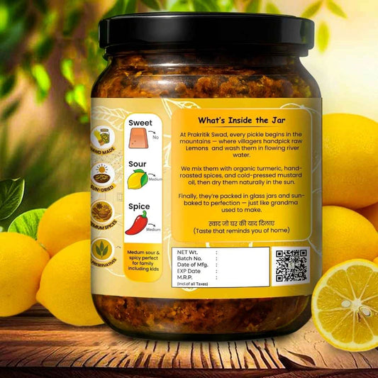 Jar of pickles with a label on a wooden surface surrounded by lemons