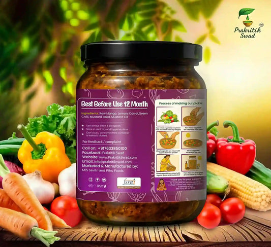 Jar of pickles with a purple label surrounded by fresh vegetables on a wooden surface.