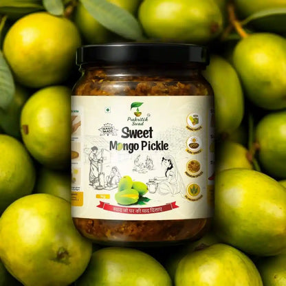 Jar of Sweet Mango Pickle surrounded by green mangoes
